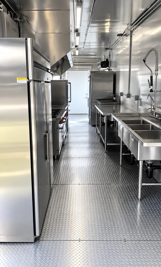Refrigeration and washing stations in a kitchen trailer