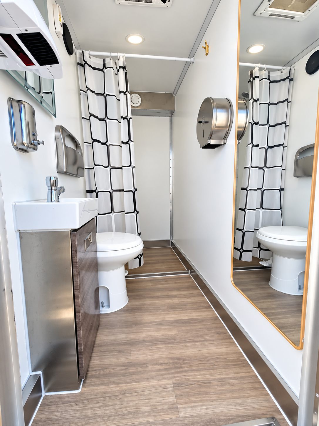 Bathroom interior with sink, toilet, and shower curtain